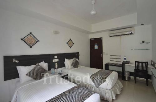 TrustedStay Service apartments in Kodambakkam, Chennai - Deluxe Bedroom
